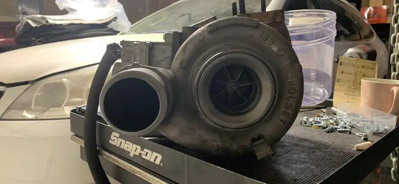 Turbocharger sitting on a Snap-on tool cart